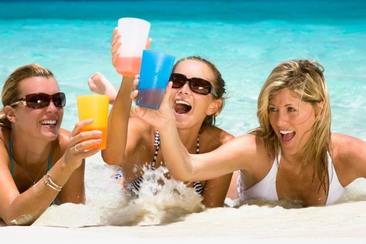 girls drinking on beach